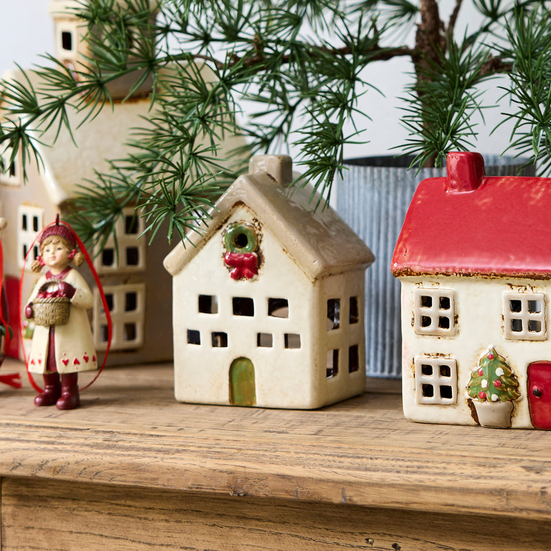 Festive ceramic villa glowing with candle – Alsace tea light house