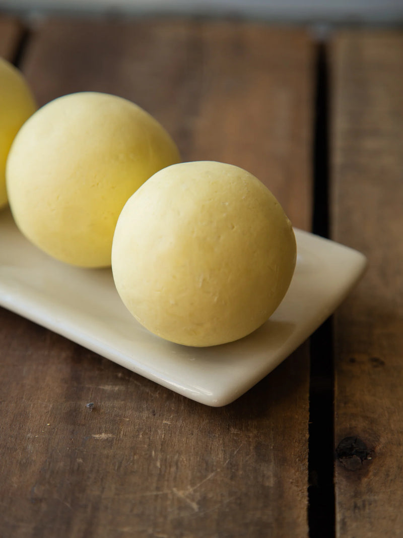 Ylang Ylang Patchouli Orange Small Soap Ball by Est Australia with a rustic hand-rolled finish.