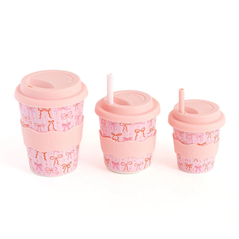 120mL pink babychino cup with all-over bow design
