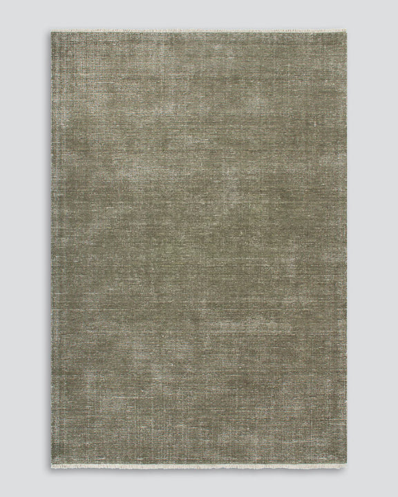 handwoven wool rug lichen green living room