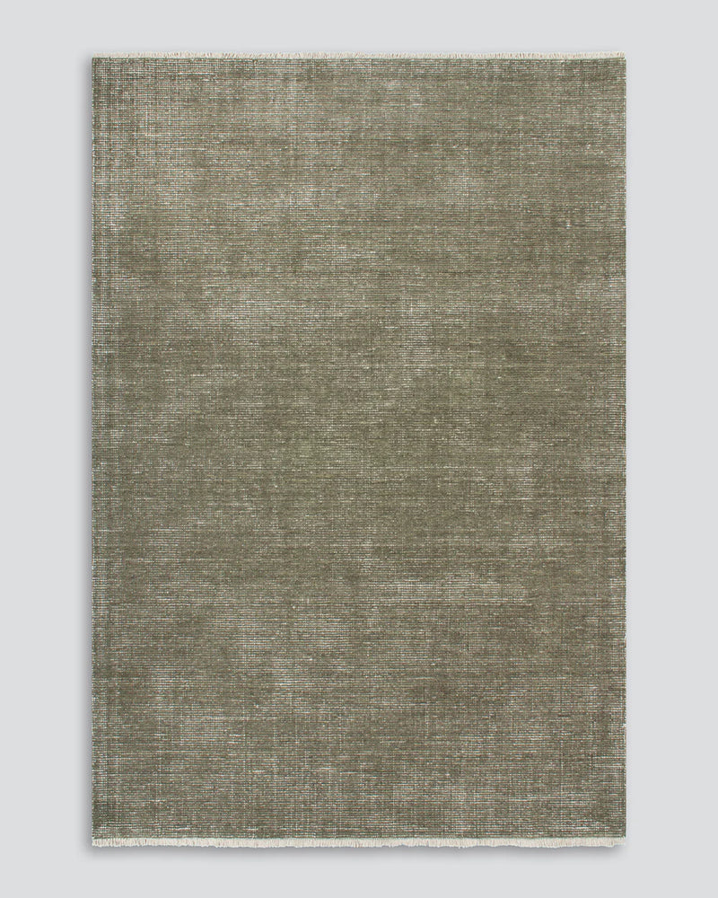handwoven wool rug lichen green living room