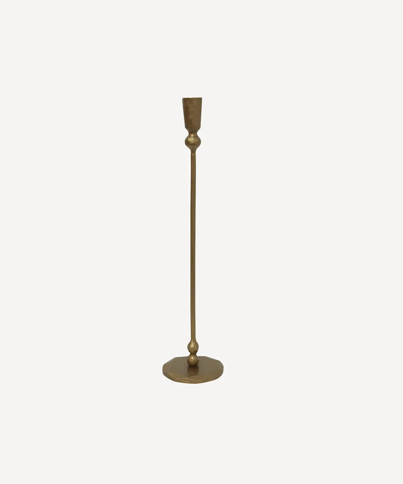 Tall gold candlestick for classic and contemporary interiors 