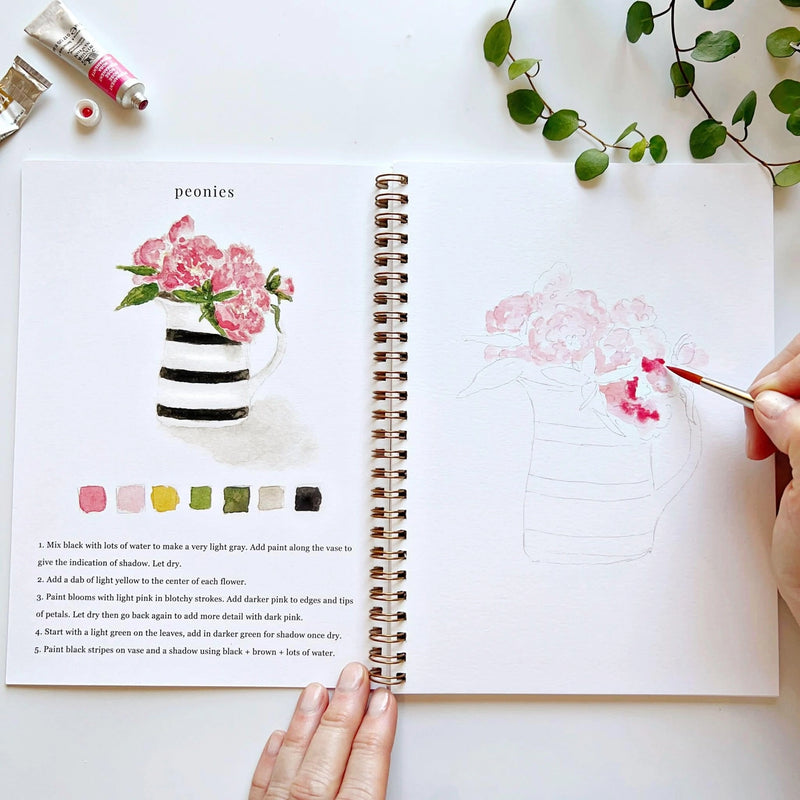 Floral watercolour painting book with lightly outlined bouquet sketches