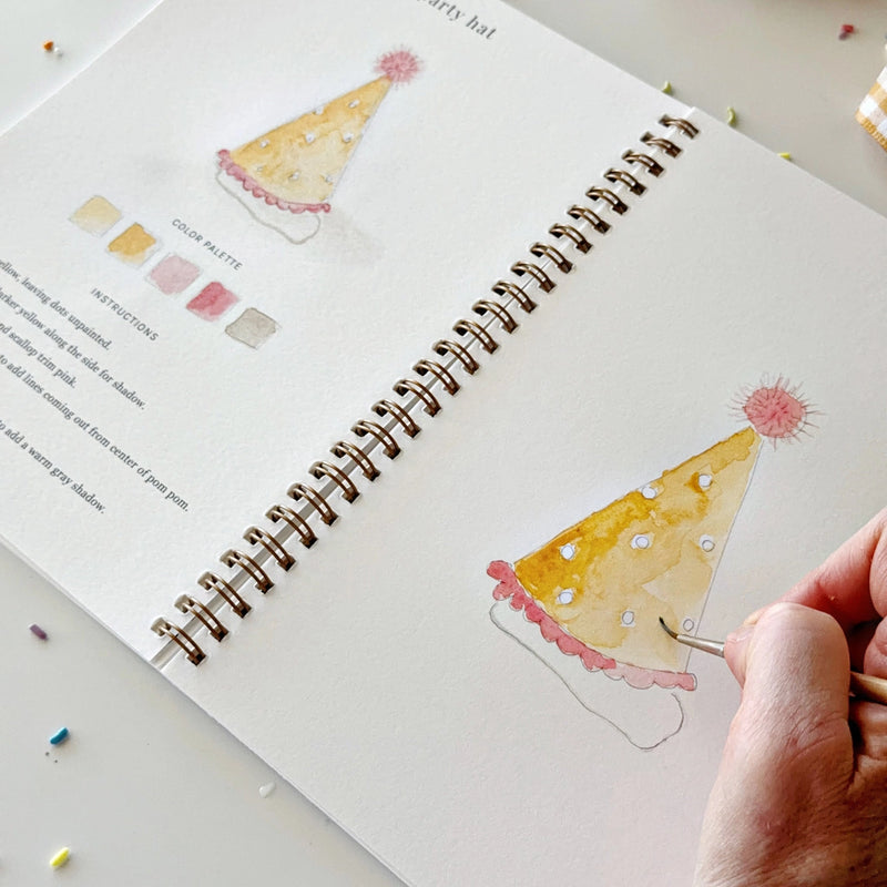 Watercolour workbook featuring balloons birthday cake gifts and party designs