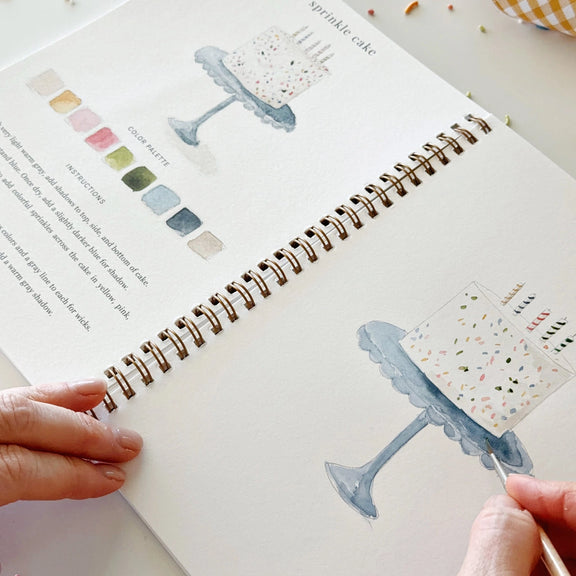 Spiral bound beginner watercolour workbook with party illustrations