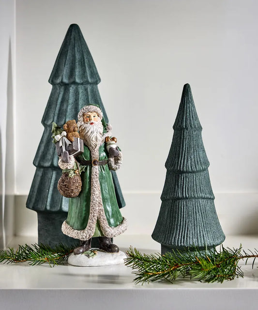 Traditional Santa carrying a bear and Christmas gifts 