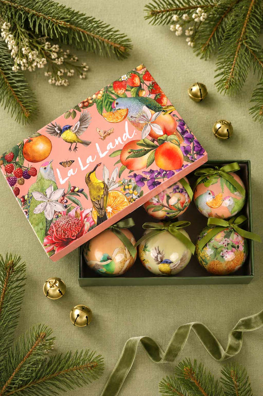 Six illustrated Christmas baubles with fruit and botanical artwork