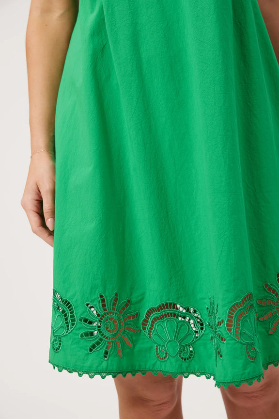 Green embroidered short dress with shirred back and side pockets