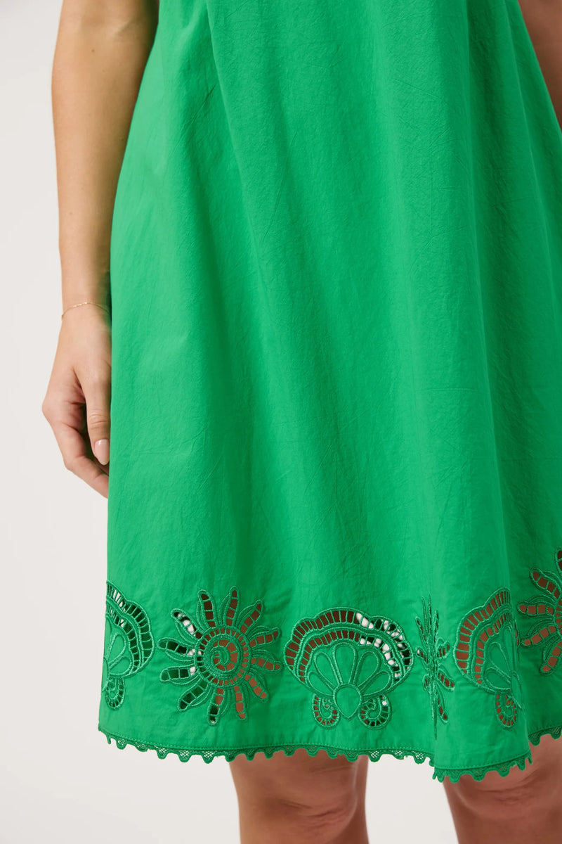 Green embroidered short dress with shirred back and side pockets