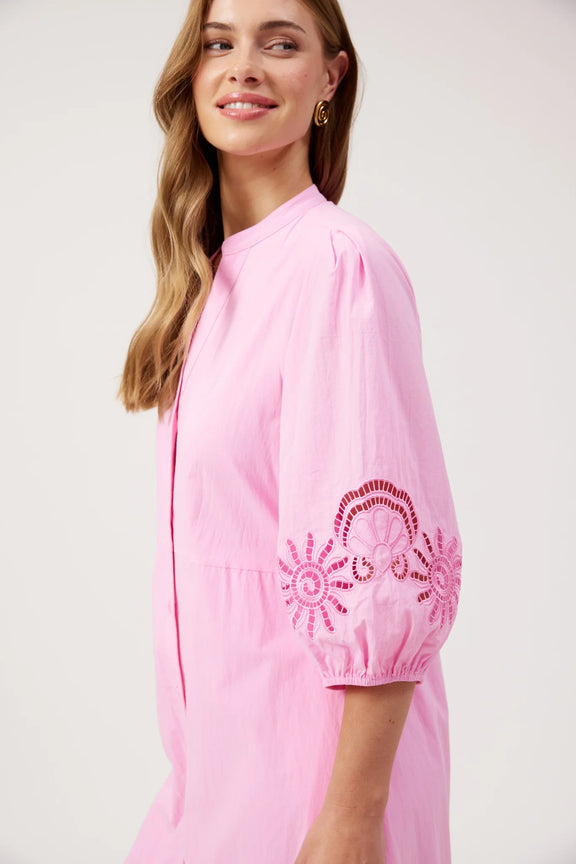 Pink embroidered maxi dress with tiered skirt and side pockets