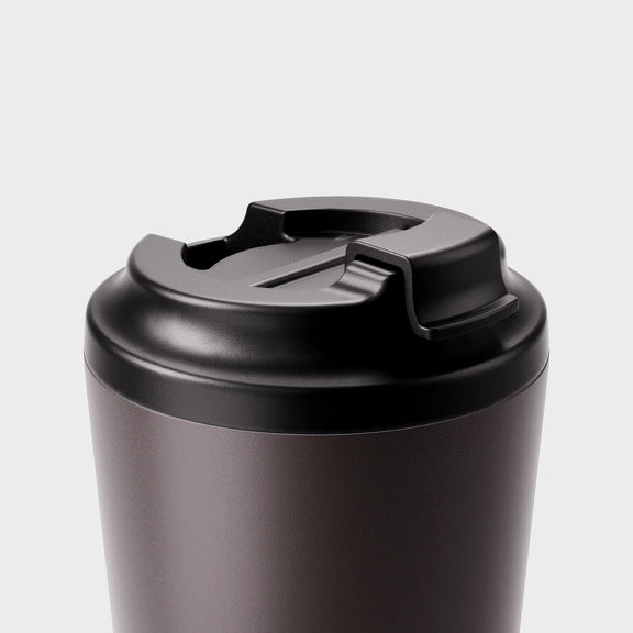 Made by Fressko insulated small coffee cup with click-back lid