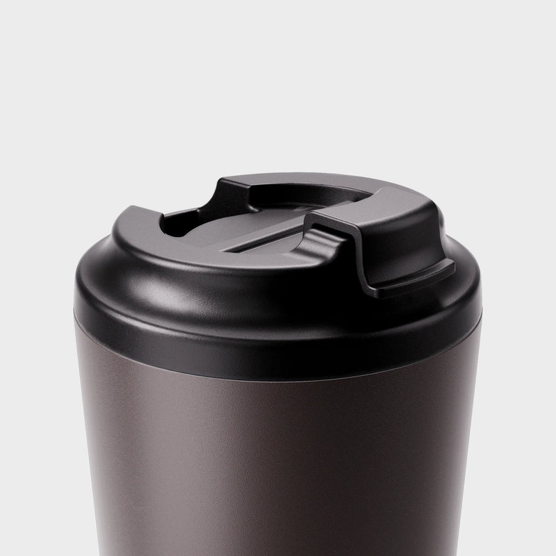 Made by Fressko insulated small coffee cup with click-back lid