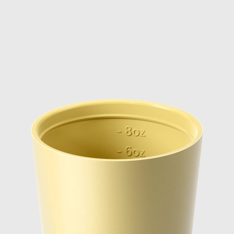 Made by Fressko insulated small coffee cup with click-back lid