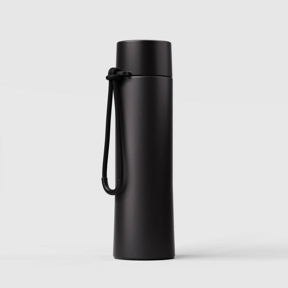 Coal reusable drink bottle with ceramic lining and flip-sip lid