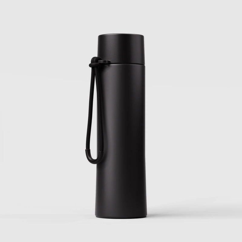 Coal reusable drink bottle with ceramic lining and flip-sip lid