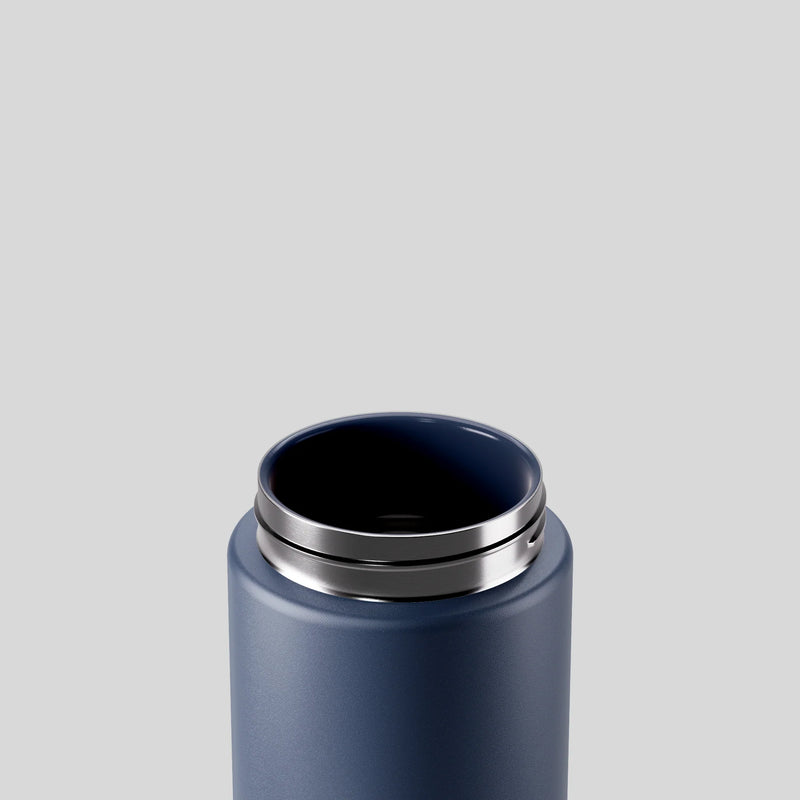 Denim blue ceramic lined insulated water bottle with straw