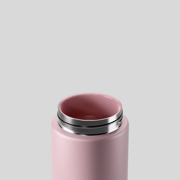 Floss reusable drink bottle with ceramic lining and flip-sip lid