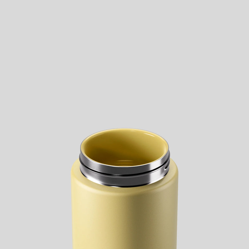 Limoncello reusable drink bottle with ceramic lining and flip-sip lid