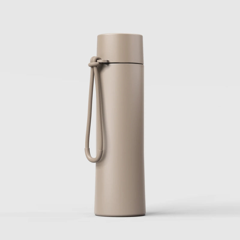 Oat reusable drink bottle with ceramic lining and flip-sip lid