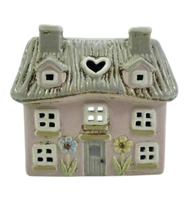 Pink ceramic Thatched Cottage tealight holder with flowers