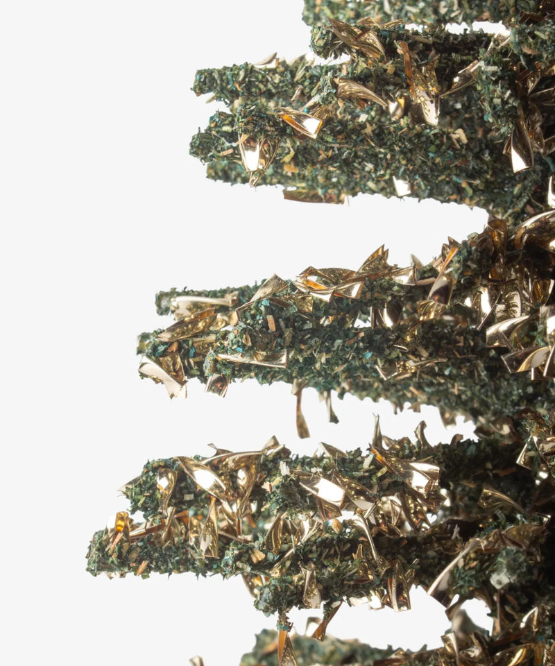 Small decorative green Christmas tree with sparkling textured finish 