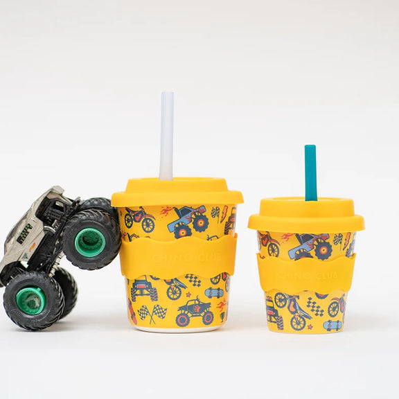 Bamboo-based babychino cup featuring trucks skateboards and motorbikes