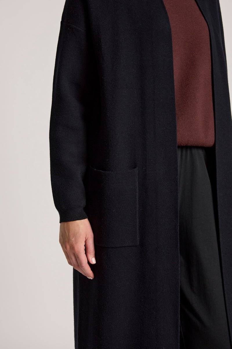 Close up of sleeve and pocket of Zala black women's cardigan - available at My Country Escape